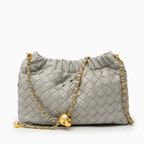 https://cdn.shopify.com/s/files/1/1037/6196/9489/files/03_-_Joyce_Shoulder_Bag_-_Grey.jpg?v=1781341886