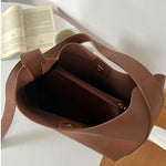 https://cdn.shopify.com/s/files/1/1057/5383/7908/files/Amelie____Elegant_Leather_Bag_7.jpg?v=1785187530