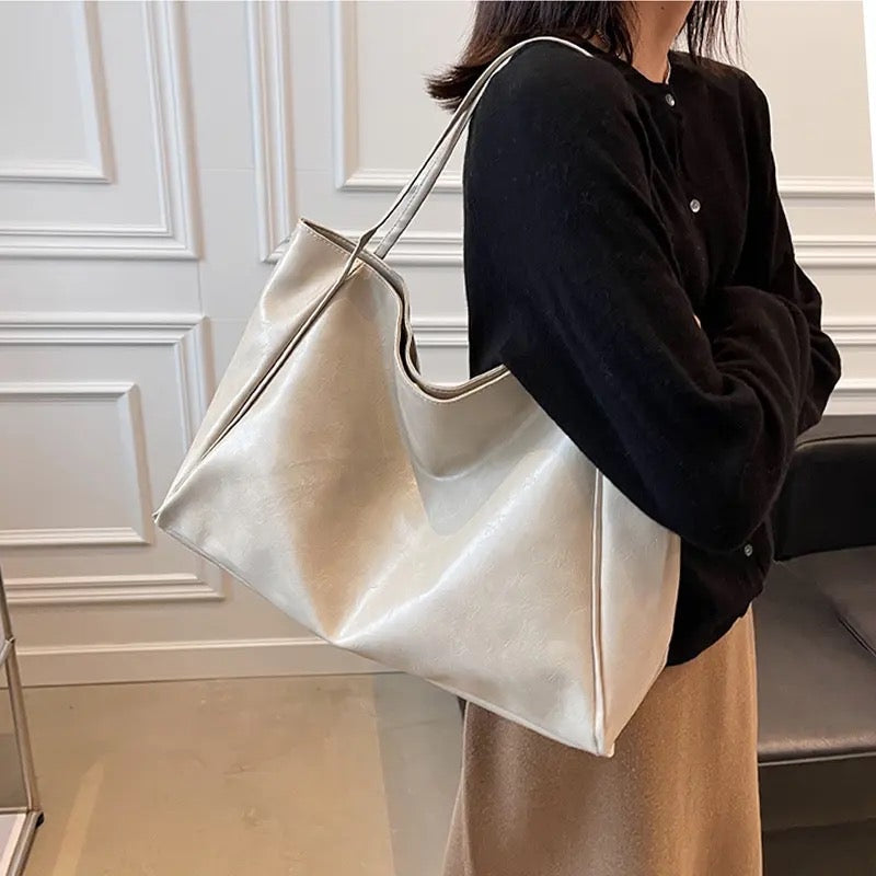 https://cdn.shopify.com/s/files/1/1057/5383/7908/files/Aurora____Sparkling_Leather_Bag_8.jpg?v=1785187549