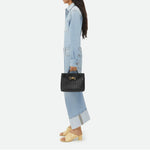 https://cdn.shopify.com/s/files/1/1037/6196/9489/files/BOTTBLACK1.jpg?v=1781341888