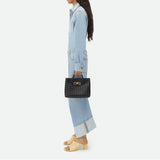 https://cdn.shopify.com/s/files/1/1037/6196/9489/files/BOTTBLACK1.jpg?v=1781341888