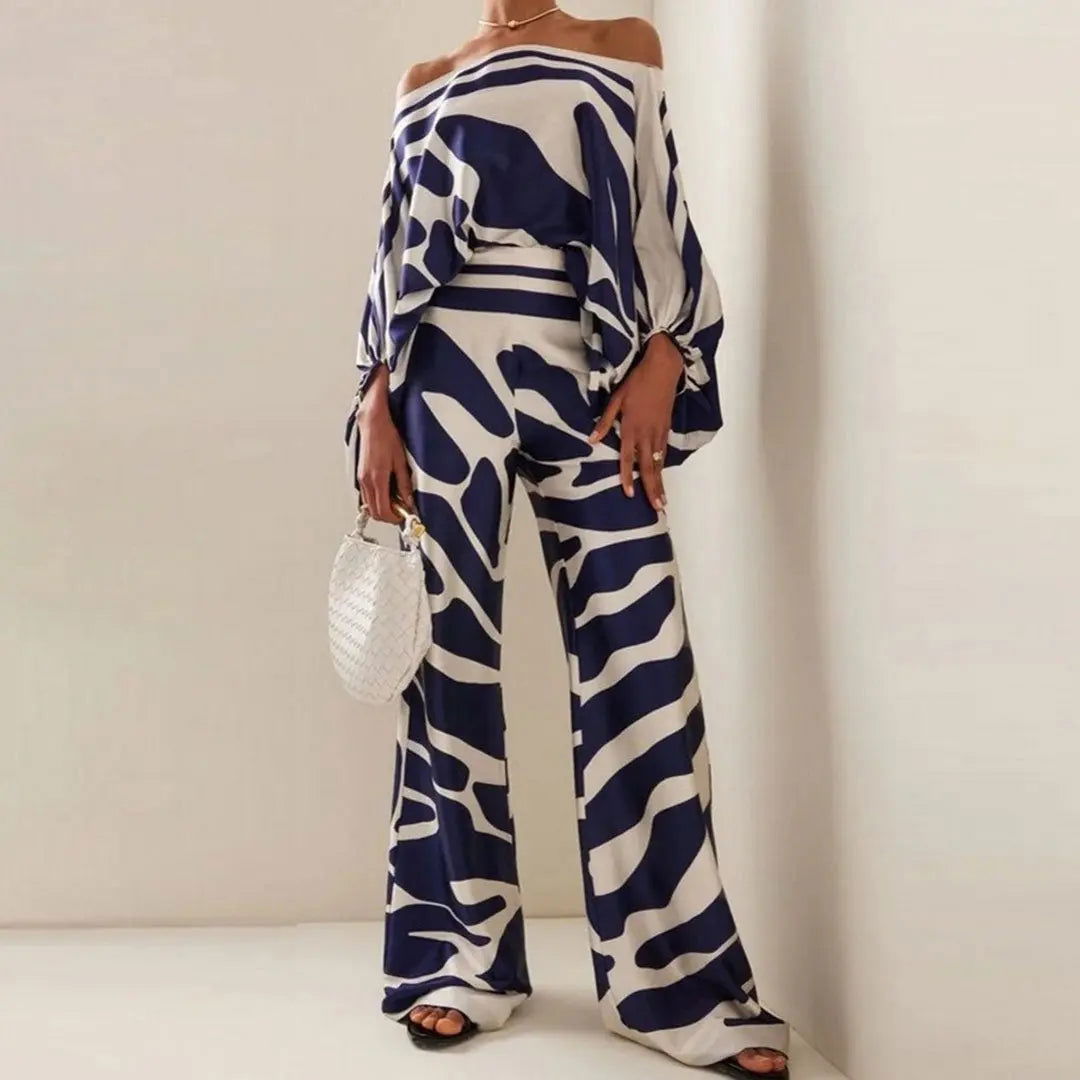 https://cdn.shopify.com/s/files/1/1037/6196/9489/files/CLAIRE_Chic_Summer_Two-Piece_Ensemble_-_Lizabella_Fashion_-_-_-_CLAIRE_Chic_Summer_Two-Piece_Ensemble_-_Lizabella_Fashion_-_tag1_-_tag2_-4957579.jpg?v=1787578611
