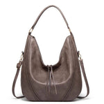 https://cdn.shopify.com/s/files/1/1057/5383/7908/files/Claire____Casual_Leather_Bag_1.jpg?v=1785187547