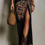 https://cdn.shopify.com/s/files/1/1037/6196/9489/files/EmbroideredCottonMaxiDressWithDeepV-NeckAndHighSlitForBohoChicStyle.jpg?v=1782852388