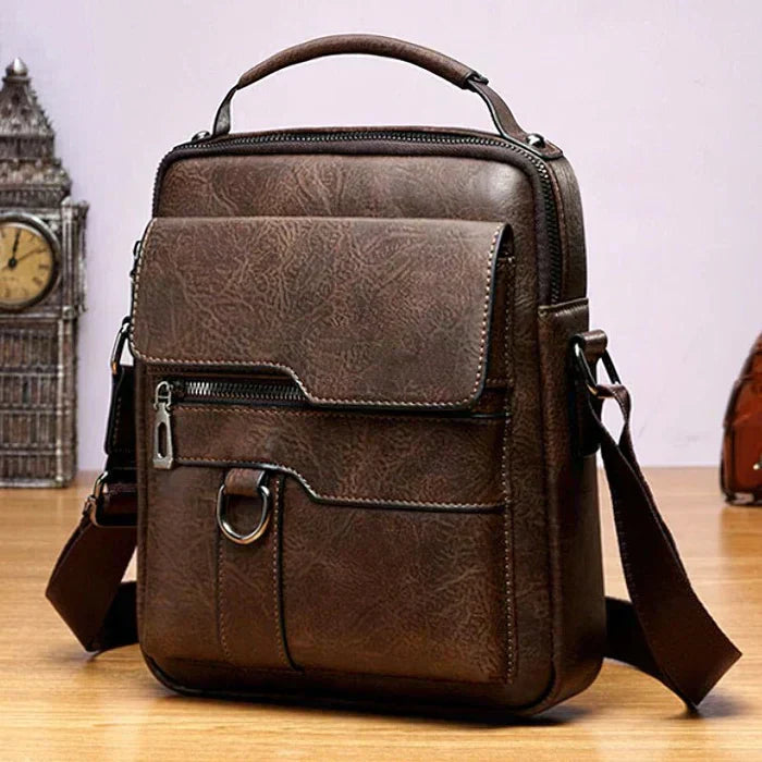 https://cdn.shopify.com/s/files/1/1057/5383/7908/files/Fabienne____Practical_Leather_Bag_2.jpg?v=1785187553