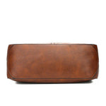 https://cdn.shopify.com/s/files/1/1057/5383/7908/files/Justine____Timeless_Leather_Bag_7.jpg?v=1785187531
