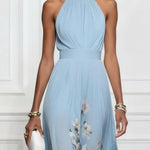 https://cdn.shopify.com/s/files/1/1037/6196/9489/files/LightBlueFloralChiffonHalterSleevelessA-LineMaxiDress_2.jpg?v=1780780329