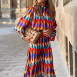 https://cdn.shopify.com/s/files/1/1057/5383/7908/files/Midi-jurk-met-gekleurde-print-2_05bf1a2b-308a-47dc-a0c5-1805c1575c89.jpg?v=1785188006