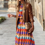 https://cdn.shopify.com/s/files/1/1057/5383/7908/files/Midi-jurk-met-gekleurde-print-3_9303ac13-ea84-4c6a-b8aa-6f308815270f.jpg?v=1785188006