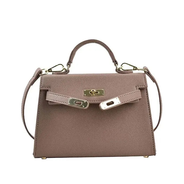 https://cdn.shopify.com/s/files/1/1037/6196/9489/files/Premium-Quality-Women-s-Handbag-2024-Spring-summer-New-Style-Trendy-Kara-Bag-Fashionable-Simple-Versatile.png_640x640_36ff0b4f-4895-46a8-8879-e01594dcbf5f.webp?v=1783845576