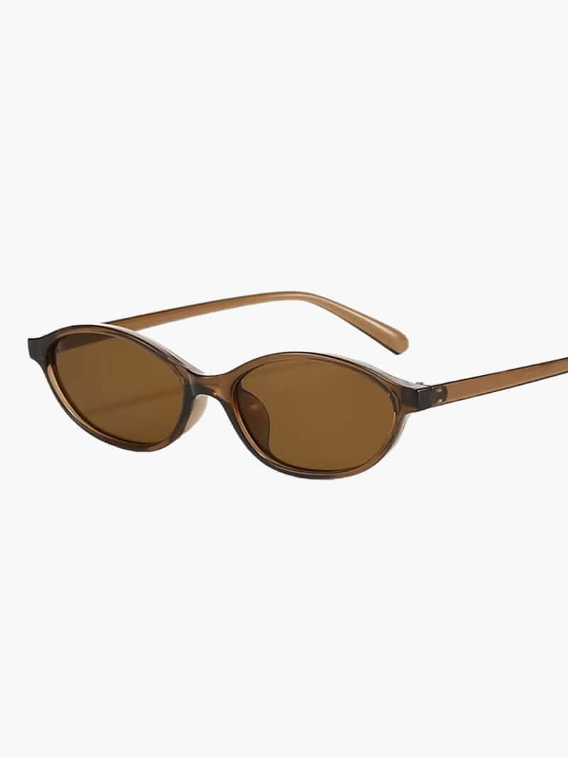 https://cdn.shopify.com/s/files/1/1057/5383/7908/files/SEAME-Kathy-Sunglasses-01.jpg?v=1785187420