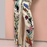 https://cdn.shopify.com/s/files/1/1037/6196/9489/files/Satin-Unique-Print-Elastic-Waist-Pocketed-Wide-Leg-Pants.jpg?v=1780780329