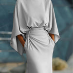 https://cdn.shopify.com/s/files/1/1037/6196/9489/files/SilverMermaidBoatNeckLongMotheroftheBrideDresswithPockets_1.jpg?v=1780780322