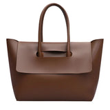 https://cdn.shopify.com/s/files/1/1037/6196/9489/files/Tote.webp?v=1781341888