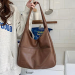 https://cdn.shopify.com/s/files/1/1057/5383/7908/files/Zoe____Refined_Shoulder_Bag_2.jpg?v=1785187547