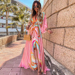 https://cdn.shopify.com/s/files/1/1057/5383/7908/files/abstract-print-belted-button-down-v-neck-maxi-dress-pink-3_700x_5fa2201b-de8b-47da-89b3-e74fdd98181f.jpg?v=1785188001