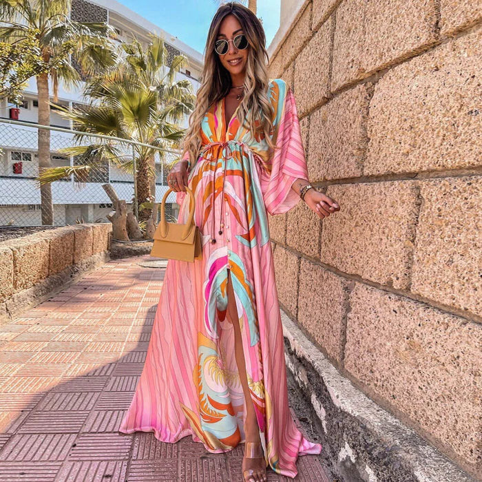 https://cdn.shopify.com/s/files/1/1057/5383/7908/files/abstract-print-belted-button-down-v-neck-maxi-dress-pink-3_700x_5fa2201b-de8b-47da-89b3-e74fdd98181f.jpg?v=1785188001