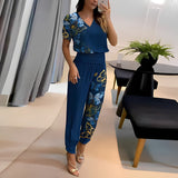 https://cdn.shopify.com/s/files/1/1057/5383/7908/files/alexandra-trendy-set-met-blouse-en-broek-947290_d3632d7a-b8da-44e5-a9d0-0cdfbad1122b.jpg?v=1785187565