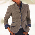 https://cdn.shopify.com/s/files/1/1037/6196/9489/files/blazer-femme-en-laine-gris-_l_gant.jpg?v=1787578942