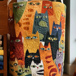 https://cdn.shopify.com/s/files/1/1037/6196/9489/files/cat_laundry_basket.png?v=1787236340