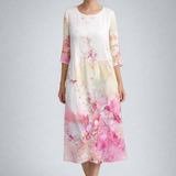 https://cdn.shopify.com/s/files/1/1037/6196/9489/files/european-fashion-studio-polish-model-floral-midi-dress-full-body-posed-shot-cool-gray-background.png?v=1781357878