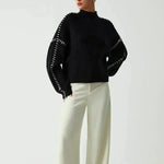 https://cdn.shopify.com/s/files/1/1057/5383/7908/files/lifegoals-Ribbed-Wool-Mock-Neck-Whipstitch-Sweater-black_1_82e2007c-16ef-4c4c-b07d-37974b9f6b59.webp?v=1785187452
