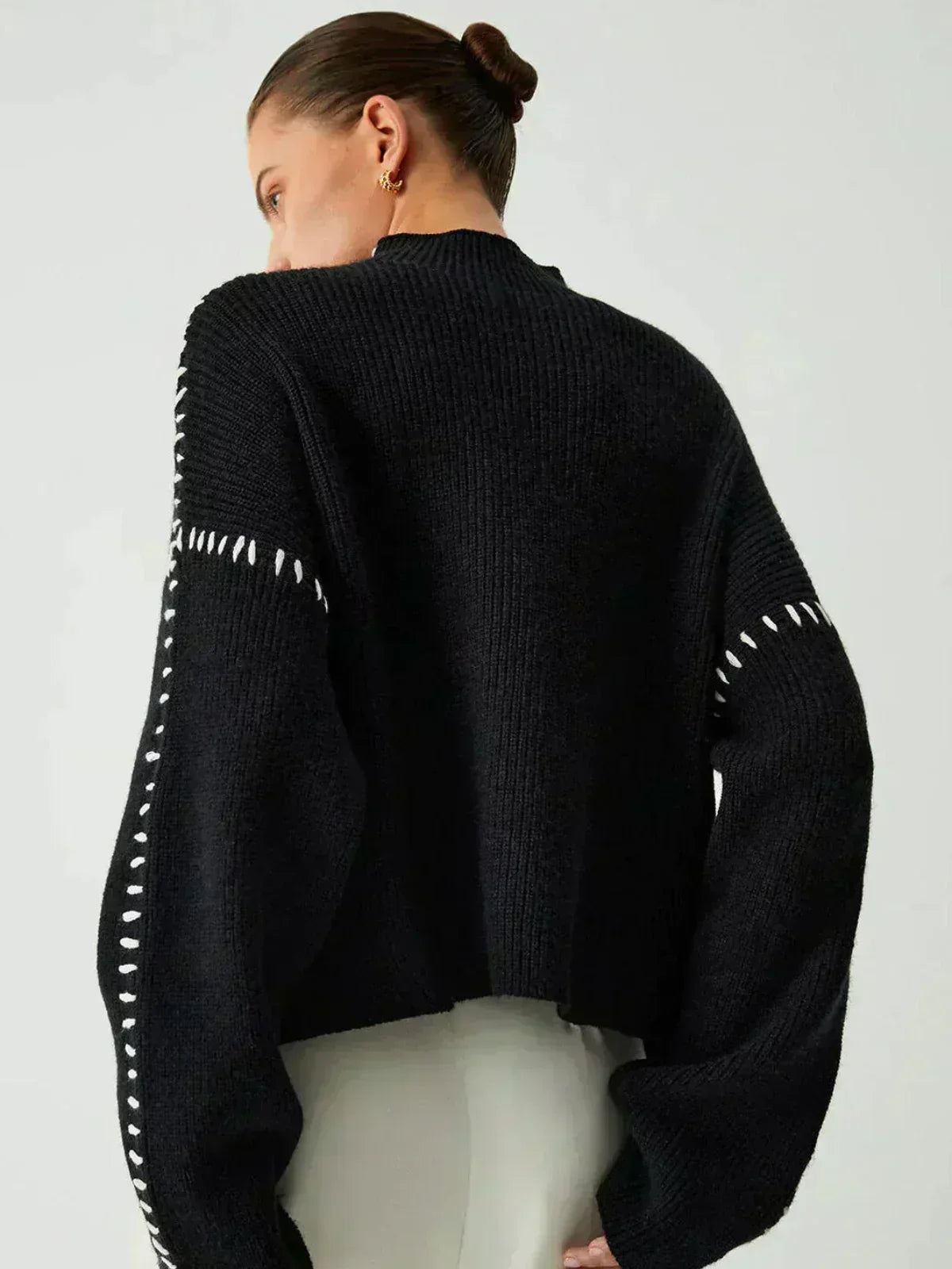 https://cdn.shopify.com/s/files/1/1057/5383/7908/files/lifegoals-Ribbed-Wool-Mock-Neck-Whipstitch-Sweater-black_2_22870718-575e-4786-a339-622734274eee.webp?v=1785187452