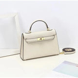 https://cdn.shopify.com/s/files/1/1037/6196/9489/files/london-bag-721430.webp?v=1781341889