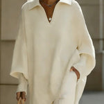 Maglione a V con maniche a pipistrello