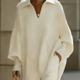 Maglione a V con maniche a pipistrello