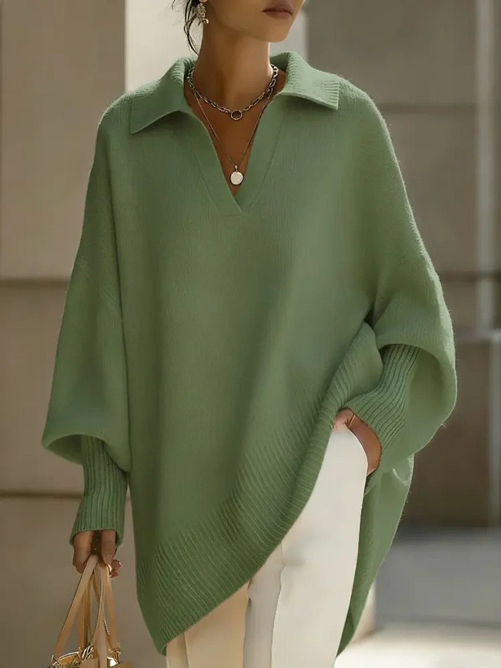 Maglione a V con maniche a pipistrello