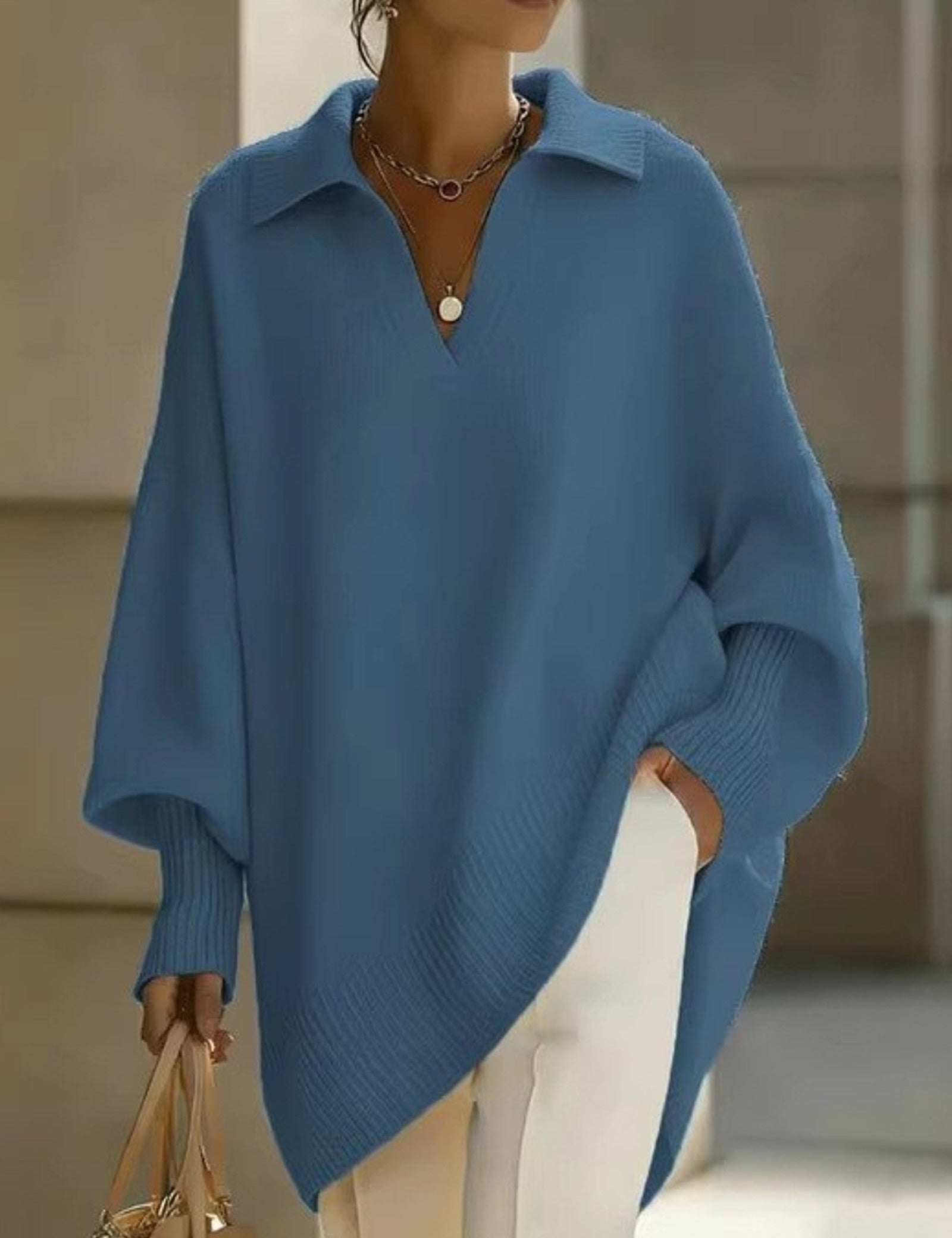 Maglione a V con maniche a pipistrello