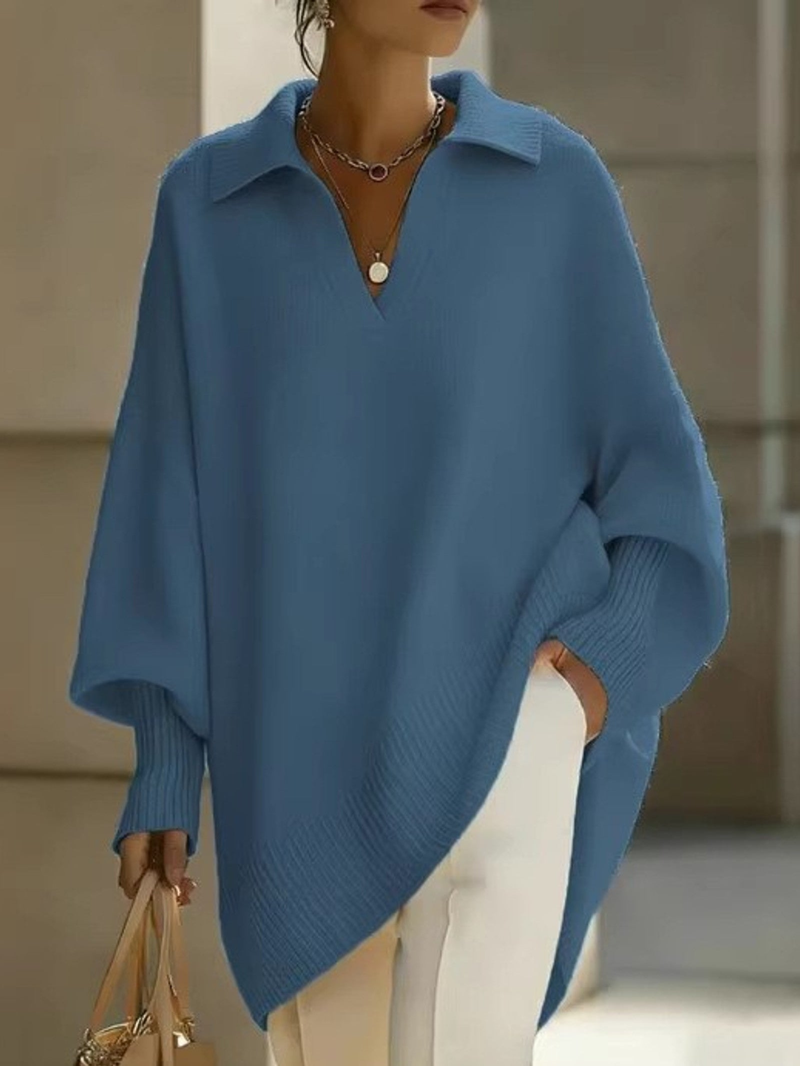 Maglione a V con maniche a pipistrello