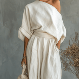 https://cdn.shopify.com/s/files/1/1037/6196/9489/files/mila-set-2-pezzi-off-the-shoulder-1861193.png?v=1783458959