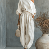 https://cdn.shopify.com/s/files/1/1037/6196/9489/files/mila-set-2-pezzi-off-the-shoulder-9345176.png?v=1783458959