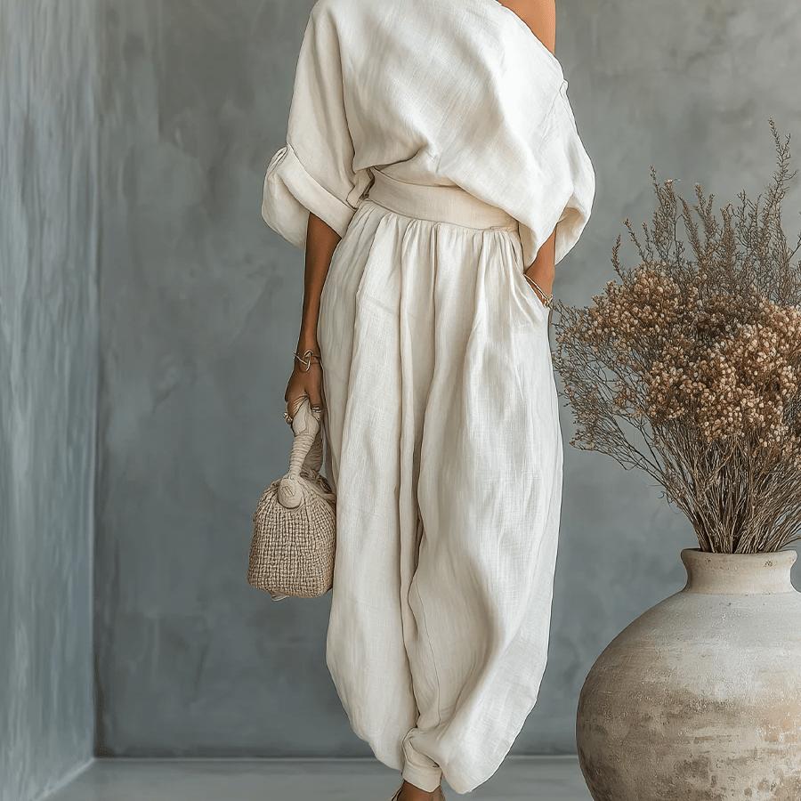 https://cdn.shopify.com/s/files/1/1037/6196/9489/files/mila-set-2-pezzi-off-the-shoulder-9345176.png?v=1783458959