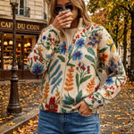 https://cdn.shopify.com/s/files/1/1057/5383/7908/files/modehaus-behrens-cardiga-botanico-creme.jpg?v=1788891702