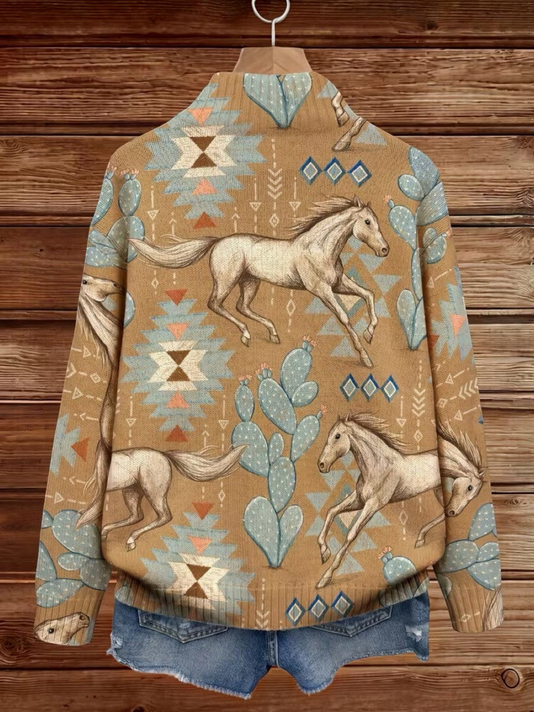 https://cdn.shopify.com/s/files/1/1057/5383/7908/files/modehaus-behrens-cardigan-cavalos-cactos.jpg?v=1788891709