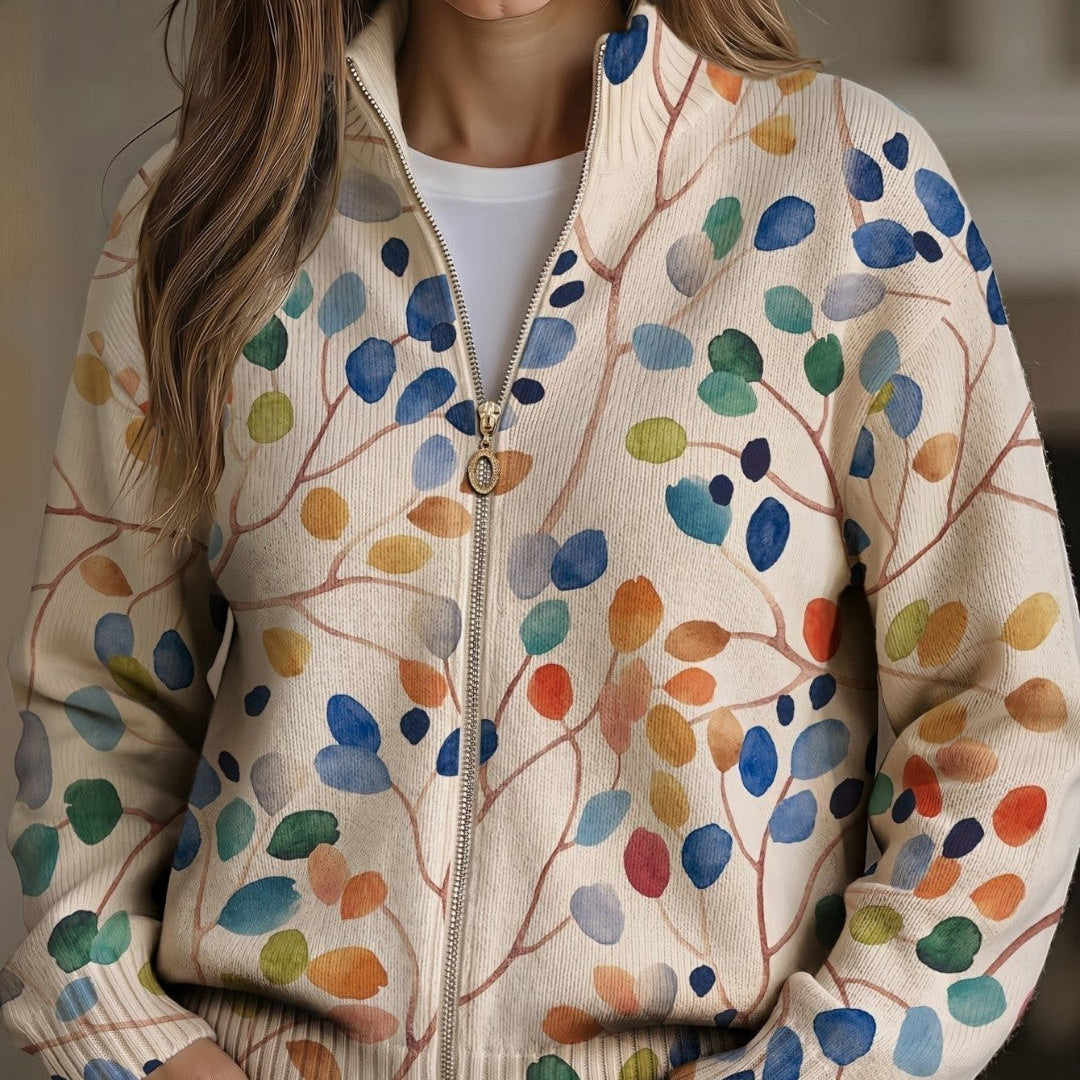 https://cdn.shopify.com/s/files/1/1057/5383/7908/files/modehaus-behrens-strickjacke-blattermuster-creme.jpg?v=1788891701