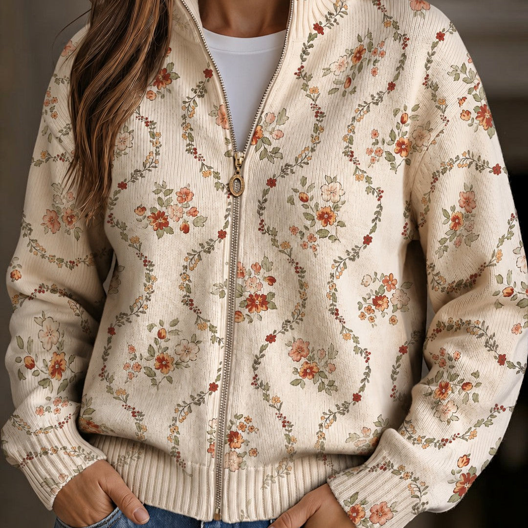 https://cdn.shopify.com/s/files/1/1057/5383/7908/files/modehaus-behrens-strickjacke-blumen-creme.jpg?v=1788891708