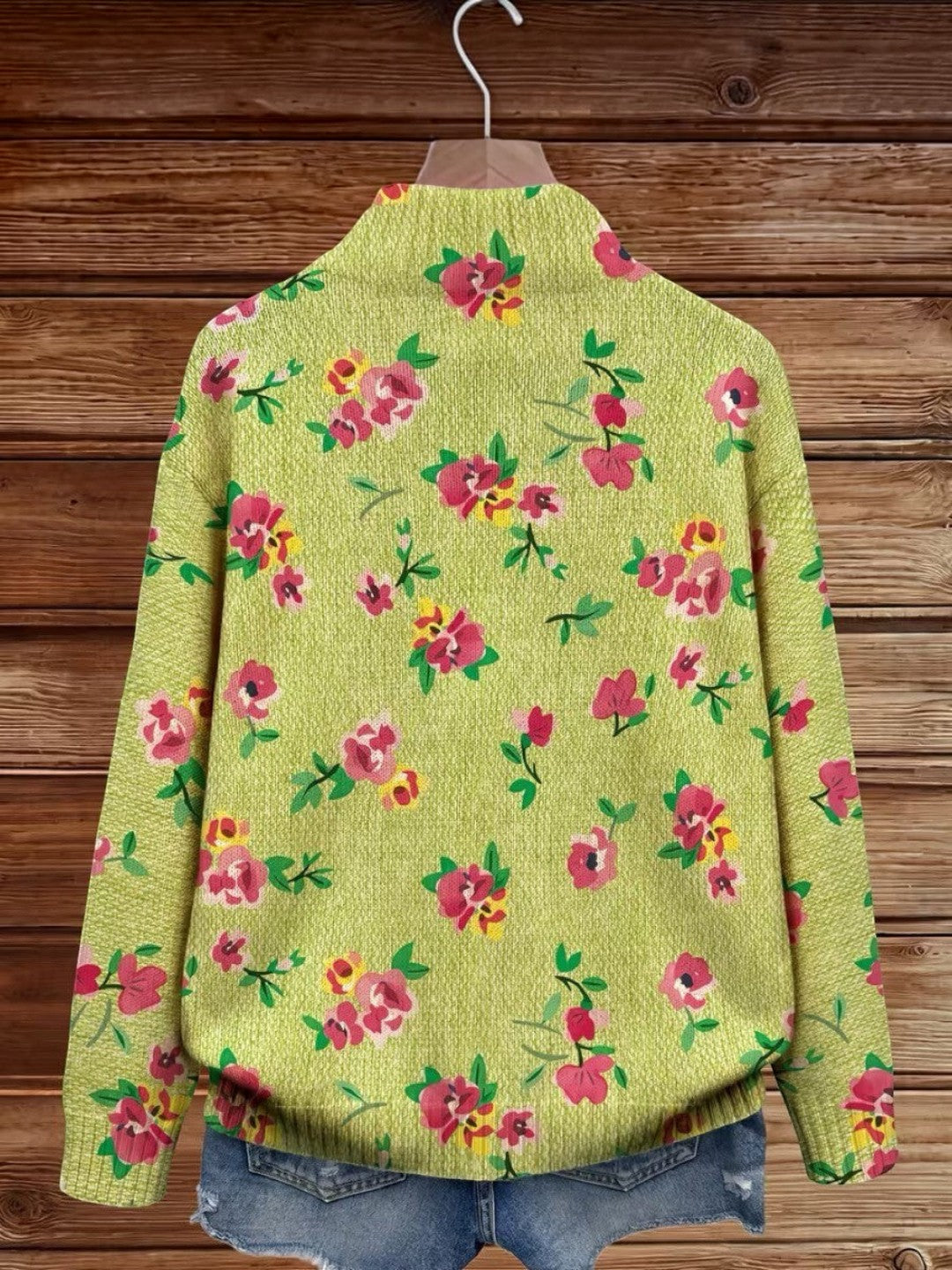 https://cdn.shopify.com/s/files/1/1057/5383/7908/files/modehaus-behrens-strickjacke-blumenmuster-gruen.jpg?v=1788891708