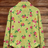 https://cdn.shopify.com/s/files/1/1057/5383/7908/files/modehaus-behrens-strickjacke-blumenmuster-gruen.jpg?v=1788891708