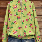https://cdn.shopify.com/s/files/1/1057/5383/7908/files/modehaus-behrens-strickjacke-blumenmuster-gruen_94b0b91d-7066-4c13-a858-de663eabeded.jpg?v=1788891708