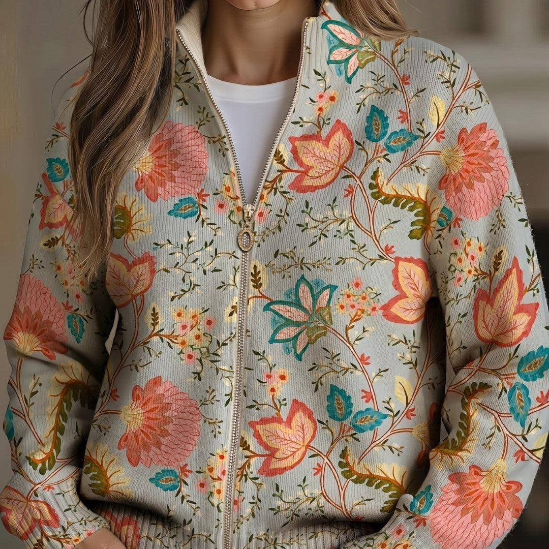 https://cdn.shopify.com/s/files/1/1057/5383/7908/files/modehaus-behrens-strickjacke-floral-reissverschluss.jpg?v=1788891696