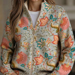 https://cdn.shopify.com/s/files/1/1057/5383/7908/files/modehaus-behrens-strickjacke-floral-reissverschluss.jpg?v=1788891696