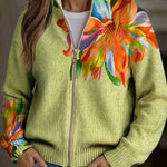 https://cdn.shopify.com/s/files/1/1057/5383/7908/files/modehaus-behrens-strickjacke-lilienmotiv-gruen.jpg?v=1788891701