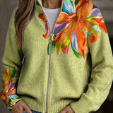 https://cdn.shopify.com/s/files/1/1057/5383/7908/files/modehaus-behrens-strickjacke-lilienmotiv-gruen.jpg?v=1788891701