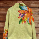https://cdn.shopify.com/s/files/1/1057/5383/7908/files/modehaus-behrens-strickjacke-lilienmotiv-gruen_53dd46b5-22fb-4787-92d0-ec9f53e76d3a.jpg?v=1788891702