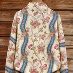 https://cdn.shopify.com/s/files/1/1057/5383/7908/files/modehaus-behrens-strickjacke-rosenmuster-elfenbein.jpg?v=1788891696
