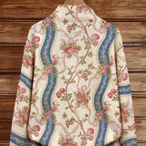 https://cdn.shopify.com/s/files/1/1057/5383/7908/files/modehaus-behrens-strickjacke-rosenmuster-elfenbein.jpg?v=1788891696